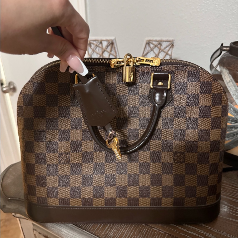 LOUIS VUITTON ALMA PM